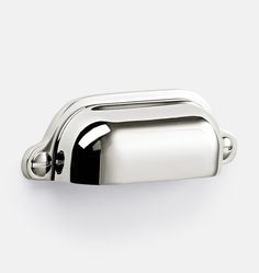 a chrome toilet paper dispenser on a white background with clippings