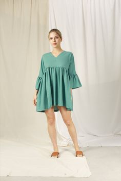 FOR THIS ITEM, WE NEED YOUR BUST, HEIGHT MEASUREMENTS SO WE CAN TAILOR THE DRESS TO FIT YOU BEST. HANDMADE ITEAM - perfect French seam - The model is 1m69 tall and wearing size S and Steel Blue Color ■ fit - OVERSIZE MINI LINEN DRESS WITH BELL SLEEVES - Has V - neck and two pockets inside ■ Sizing details and color - Please choose sizes carefully as we provided a very detailed sizing guide. - If you're not sure with sizing you can send us your information you want to get help before placing an order. - For complex custom request, we will charge an extra 50% of the item cost. - Please note that actual colors may slightly vary due to your computer resolution and monitor color settings. ■ Care instructions -With washing machine: In washing bag, please choose Cotton/ Linen washing option. Best Short Linen Dress, Linen Dress Short, Dress With Bell Sleeves, Dress For Summer, French Seam, Bell Sleeve Dress, Linen Dresses, Dress Short, Steel Blue