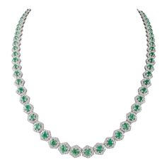 This is part of Chairish’s Fine Jewelry assortment.  Rare Hexagon Cut Emerald and Diamond Halo Tennis Necklace in 18K Gold studded with hexagon cut emeralds and diamonds. This stunning piece of jewelry instantly elevates a casual look or dressy outfit.  Emerald enhances intellectual capacity of the person. Designed with hexagon cut emerald each set in between the diamonds in solid gold settings. This is a perfect Unique Gift, Bridal Shower Gift, Secret Santa Gift, Gift For Sister, Mother Daughte Formal Emerald Necklaces With Single Cut Diamonds, Formal Emerald Necklace With Single Cut Diamonds, White Gold Octagon Necklace For Formal Events, Luxury Emerald Cut Diamond Emerald Necklace, Luxury Hexagon Jewelry For Formal Events, Fine Jewelry Octagon Necklace For Formal Occasions, Formal White Gold Octagon Necklaces, Hexagon Brilliant Cut Jewelry For Formal Occasions, Octagon Shaped Fine Jewelry Necklace For Anniversary