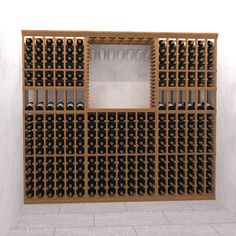 a wine rack with many bottles in it on the wall next to a tiled floor