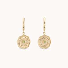 French for “Lucky Charm”, the Porte Bonheur Raised Gold Coin Earrings serve as precious symbols of protection and good fortune. These Wee earrings are 11mm coins dangling from 10mm gold huggies. The Peridot featured promotes prosperity, growth, and openness. It is the gemstone of Leos and Virgos born in August. Gold Coin Earrings, Symbols Of Protection, Gold Huggies, August Born, Coin Earrings, Nameplate Necklace, Gold Coin, Luck Charms, Desert Rose