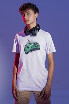 Looking for a stylish and unique T-shirt to add to your wardrobe? Check out our retro neon video game controller graphic t-shirt from Bella + Canvas! This unisex tee features a vintage inspired design that will add a pop of color and personality to any outfit.  Our t-shirt is made with high quality materials ensuring a comfortable and long lasting fit. It is available in multiple sizes and colors, so you can find the perfect match for your style. This tee is perfect for anyone who loves retro or Casual Short Sleeve T-shirt For Gaming Events, Neon Video, Vintage Vibes Retro, Purple Crayon, Yellow Belt, Retro Neon, Video Game Controller, Gamer Gifts, Vintage Inspired Design