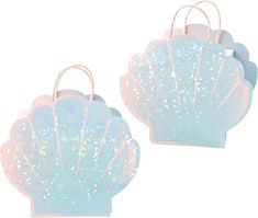 two white bags with holographic designs on them