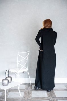 Long Sleeve Knitted Sweater Dress For Loungewear, Long Knit Sweater Dress For Loungewear, Black Turtleneck Sweater Dress For Winter, Black Turtleneck Sweater Dress For Fall, Black Sweater Dress With Boots Maxi, Black Maxi Sweater Dress, Cozy Long Black Sweater, Long Black Knit Sweater, Long Black Casual Sweater Dress