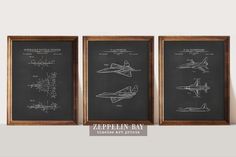 three framed drawings of fighter jets on a gray background with the words zepplin bay below them