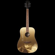 an acoustic guitar with a woman's face on it