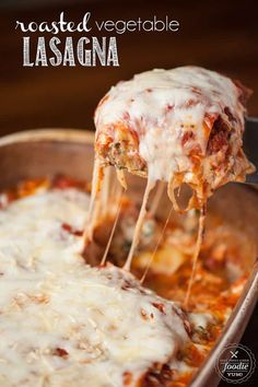 lasagna being lifted from a casserole dish