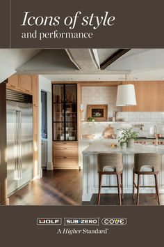 a kitchen with two stools and an island in front of the counter top is shown