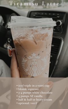 a person holding up a drink in their hand with the words, starbucks latte