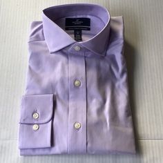 Pretty Lavender Colored Shirt! Brand New In The Bag. Great Purchase! Purple Cotton Business Casual Shirt, Business Casual Purple Cotton Shirt, Purple Fitted Top For Semi-formal Occasions, Fitted Purple Top For Semi-formal Occasions, Purple Slim Fit Shirt For Spring, Purple Slim Fit Shirt For Business, Slim Fit Purple Business Shirt, Purple Long Sleeve Dress Shirt For Business Casual, Purple Slim Fit Business Shirt