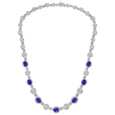 This extraordinary Necklace is consist of 7 Fine oval Tanzanite weighing approximately 11 Carats. There are total of approximately 13 carats of shimmering white diamonds, The clear, intense hue of this tanzanite is the most coveted of all these rare stones. In fact, deep blue tanzanites such as this one are worth more per carat than the more common light purple hues, Necklace is set in 18 Karat white gold. weight of 18 Karat gold is 27 Grams All our jewelry comes with a certificate appraisal and Ruby Diamond Necklace, Ruby And Diamond Necklace, Cascade Necklace, Diamond Drop Necklace, Tiaras Jewellery, Tanzanite Pendant, White Gold Pendant Necklace, Tanzanite Necklace, Diamonds Necklace