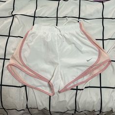 Never Worn And I’m Perfect Condition Nike Stretch Athletic Shorts For Summer, Stretch White Athletic Shorts, White Stretch Athletic Shorts, White Sporty Shorts For Spring, White Athleisure Shorts For Spring, Stretch White Gym Shorts, White Stretch Gym Shorts, White Stretch Shorts For Gym, White Athleisure Shorts For Workout