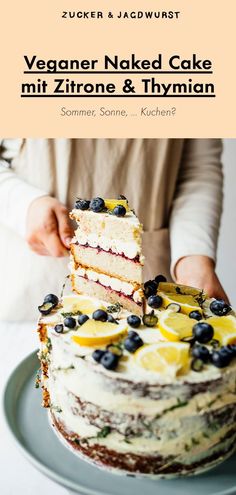 a cake with blueberries and lemons on it