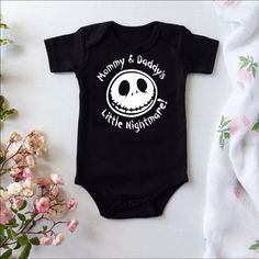 Super Soft Little Nightmare Onsie Black Short Sleeve Sleepwear With Graphic Print, Black Graphic Print Short Sleeve Sleepwear, Black Halloween Sleepwear For Sleepover, Black Cartoon Print Sleepwear For Sleepover, Black Cartoon Print Sleepwear, Casual Black Sleepwear With Cartoon Print, Black Graphic Print Sleepwear For Bedtime, Black Graphic Print Sleepwear, Black Onesie For Halloween Playtime