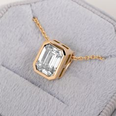 Lab Grown Diamond Pendant,Solid 14K Solid Gold Floating Pendant,Emerald Cut Lab Diamond Necklace,Solitaire Pendant for Her,Bezel Set Pendant ★ ★ CUSTOM/DUTY-FREE SHIPPING WORLDWIDE, BUYERS DON'T HAVE TO PAY ANY CUSTOM FEES WHILE IMPORTING ★ ★ Details Made to order Material: 14k/18k Gold Color Options: Yellow Gold, White Gold, Rose Gold, ★ Center Stone: Lab Grown Diamond, Emerald Cut  Size: 7*9mm ★If you choose to buy the Solid Gold Chain with the pendants, it is adjustable for 14 inches, 16 inch Diamond Necklace Solitaire, Diamond Solitaire Necklace, Solid Gold Chains, Solitaire Pendant, Lab Diamonds, Emerald Cut, Diamond Pendant, Favorite Things List, Lab Grown