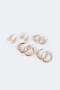 Hoop Earring Pack – edikted Earring Pack, Gold Hoop, Heart Print, Gold Tone Metal, Gold Earrings, Gold Rings, Gold Bracelet, Gold Tones, Hoop Earrings