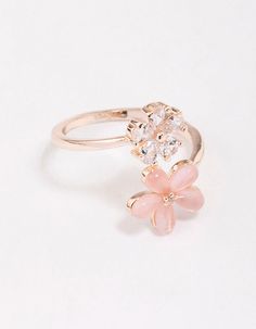 Warm up your stack with this gorgeous, rose gold cocktail ring. This ring features a spiral shaped silhouette, adorned with daisy motifs for a feminine finish. Dimensions: Diameter 18.5mm x Band Width 2mm | Lovisa Rose Gold Double Daisy Wrap Ring, Size: Medium/Large, Clear Rose Gold Jewelry For Anniversary In Spring, Rose Gold Jewelry For Spring Anniversary, Rose Gold Ring For Spring, Spring Rose Gold Ring Jewelry, Spring Wedding Rose Gold Flower Ring, Spring Rose Gold Flower Ring, Rose Gold Cocktail, Spiral Shape, Gold Cocktail Ring