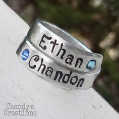 "Chandy's Creations-3-Names-Birthstones-Solid WRAP Ring-Mother's-Ring-Stacked-Rings-Present-Gift-Band-Customized-Thumb-Pinky-Hammered-Set-Three-Aluminum-Stamped Please read the shop Announcement for current and important information prior to purchase. WELCOME TO CHANDY'S CREATIONS! I am so happy you found my little shop Feel free to browse my other listings. I offer a wide range of Handmade items such as personalized Rings, Wearable Wire Art, Spoon Jewelry, Customized Flatware, Keychains, Rememb Hand Stamped Adjustable Jewelry For Anniversary, Adjustable Hand Stamped Jewelry For Anniversary, Hand Stamped Silver Jewelry For Anniversary, Silver Hand Stamped Jewelry For Anniversary, Customizable Adjustable Silver Jewelry, Custom Adjustable Sterling Silver Jewelry, Silver Hand Stamped Jewelry For Birthday, Birthday Hand Stamped Silver Jewelry, Adjustable Silver Jewelry For Personalized Gift