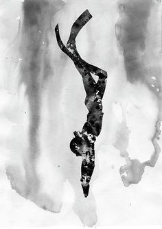 a black and white photo of a person doing a handstand in the air