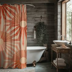 a bathroom with a bathtub, sink and shower curtain in orange and white colors