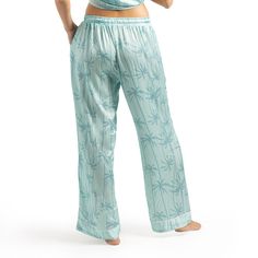 Elevate your beauty sleep with our enchanting pajamas! Drift off into a luxurious slumber wrapped in the silky embrace of our satin pj pants, designed for ultimate comfort with a cozy elastic waistband and a generously relaxed wide leg cut, accented with delicate piping. These silky satin pj pants are not just a dream to sleep in; they also help keep you cool, combat frizz, and prevent wrinkles, ensuring you wake up feeling and looking refreshed. Embrace the secret to a beautiful night's sleep, Wide Leg Sleepwear With Elastic Waistband For Sleepover, Green Sleepwear Long Pants For Sleepover, Vacation Sleepwear With Elastic Waistband, Green Long Pants For Bedtime, Blue Wide Leg Sleepwear For Pajama Party, Green Long Pants Sleepwear For Lounging, Relaxed Fit Wide Leg Sleepwear For Pajama Party, Satin Pajama Pants, Just A Dream