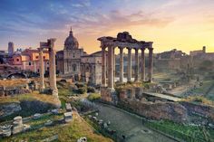 an aerial view of the roman ruins at sunset