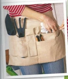 a woman is holding her pockets full of kitchen utensils