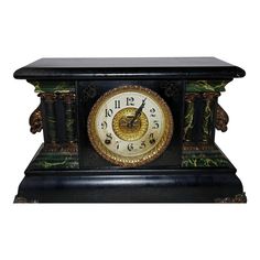 an ornate clock with roman numerals on the face