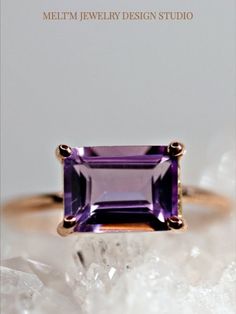 Emerald cut amethyst ring. This beautiful amethyst ring was made of 14k solid rose gold band and 8*6mm emerald cut amethyst stone in 14k rose gold prong setting   14k rose gold band is 1.3mm thickness .  This ring was handcrafted in our California Studio.  It's also available in 14k yellow gold or white gold.  #AmethystRing #EmeraldCutAmethyst #RoseGoldAmethystRing #GemstoneRing #PurpleRing Elegant 14k Gold Rectangular Amethyst Ring, Modern Emerald Cut Amethyst Ring Gift, Modern Emerald-cut Amethyst Ring Gift, Emerald Cut Amethyst Ring In Yellow Gold, Emerald Cut Amethyst Ring With Prong Setting, 14k Rose Gold Jewelry With Emerald Cut Gemstone, Fine Jewelry Emerald Cut Amethyst Ring Gift, Fine Jewelry Amethyst Ring With Emerald Cut, Emerald Cut Amethyst Ring In Fine Jewelry Style