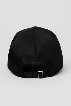 Get the quiet luxury look in this new satin take on our classic Off Duty hat. It’s designed with the same classic fit and curved brim, plus a shiny buckle in back to adjust the fit. Best of all? It works with everything from chic tailoring to a laid-back sweat set. Luxury Black Baseball Cap With Curved Bill, Luxury Black Curved Bill Baseball Cap, Luxury Adjustable Baseball Cap With Short Brim, Classic Trucker Hat With Short Brim, Luxury Look, Sweat Set, Quiet Luxury, The Quiet, Alo Yoga