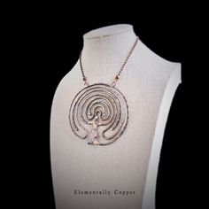 Introducing the Tapuat Copper Pendant with Oxidized Copper Ball Chain - a stunning piece of jewelry that embodies the essence of life, connection, and renewal. Crafted from 12 gauge copper wire, this pendant showcases the intricate artistry and attention to detail that goes into every creation. The Tapuat symbol, with its distinctive double spiral, is a powerful representation of balance and harmony. It serves as a reminder of the interconnectedness of all things and the continuous cycle of life. With its rich history and profound meaning, wearing this pendant allows you to carry a symbol of significance close to your heart. The pendant comes with an oxidized copper ball chain, adding a touch of elegance and versatility to your style. The chain's durability ensures that it will withstand t Symbolic Silver Copper Jewelry, Symbolic Silver-colored Copper Jewelry, Spiritual Silver Jewelry In Copper, Spiritual Silver-colored Copper Jewelry, Symbolic Copper Jewelry As Gift, Symbolic Copper Jewelry For Gifts, Symbolic Copper Jewelry Gift, Artisan Rose Gold Metal Jewelry, Symbolic Nickel-free Copper Jewelry