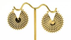 Tawapa's Small Afghan Disc in yellow gold. Luxury Gold Engraved Earrings, Luxury Engraved Gold Earrings, Bohemian Gold Hallmarked Jewelry, Yellow Gold Metal Jewelry For Festivals, Gold Engraved Jewelry For Festival, Festival Yellow Gold Brass Jewelry, Festival Yellow Gold Metal Jewelry, Traditional Gold Jewelry For Festival, Yellow Round Brass Jewelry