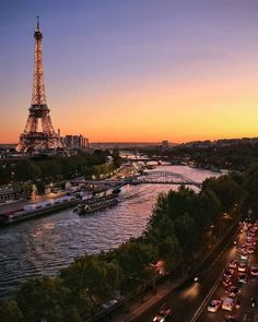 the eiffel tower towering over the city of paris, france at sunset or dawn