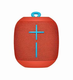 an orange bluetooth speaker with a cross on it