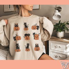 Get your trick or treat on with this super fun super spooky Halloween shirt! Cat lover Halloween gift for her special day!  ♥Adult Unisex Sweatshirt ♥ Super soft and Comfy 100% cotton  ♥This item runs a size large for women, consider sizing down.  ♥SIZING Please use sizing chart to understand the measurements.  WE DO NOT ACCEPT EXCHANGES, RETURNS OR CANCELLATIONS. ♥WASHING INSTRUCTIONS Machine wash warm, inside out, with like colors. Use only non-chlorine bleach. Tumble dry medium. Do not iron. Fall Crew Neck Sweater With Cat Design, Crew Neck Sweater With Cat Design For Fall, Fall Cotton Sweater With Cat Print, Spooky Fall Tops With Cat Print, Spooky Cat Print Tops For Fall, Spooky Cat Design Tops For Fall, Ugly Christmas Sweater Cat, Fall Cat, Cat Christmas Sweater