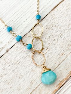 "14 kt gold fill necklace and Sleeping Beauty Turquoise.  18\" length" Hand-strung Blue Turquoise Necklace For Jewelry Making, Adjustable Hand-strung Turquoise Necklace, Turquoise Long Hand-strung Necklace, Unique Hand-strung Turquoise Beaded Necklace, Gift-ready Polished Turquoise Bead Necklace, Long Pearl Earrings, Light Jewelry, Modern Light, Sleeping Beauty Turquoise