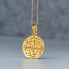 "Solid gold cross necklace, ICXC NIKA necklace (meaning: \"Jesus Christ conquers\"), Constantinato coin, protection charm. The pendant is available in 14k and 9k yellow solid gold. You can purchase the charm with a solid gold chain in 3 different lengths (9k for the 9k charm and 14k for the 14k charm) or as a pendant only (without chain). The pendant measures 1.8 cm/0.7 inches (without the loop). DHL EXPRESS shipping available at check out. PLEASE NOTE THAT DHL EXPRESS SHIPPING MIGHT BE MORE EXP Necklace Meaning, Byzantine Cross, Saint Helena, Gold Cross Necklace, Jesus Christus, Solid Gold Chains, Jewelry Pendants, Gold Coin, Gold Cross