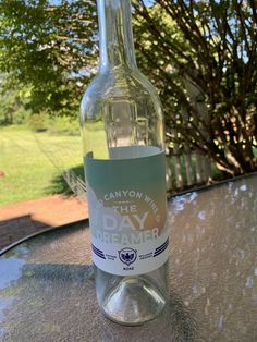 a bottle of water sitting on top of a table