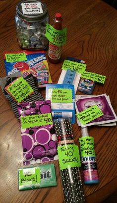 the table has many items on it including candy, candies and condiments