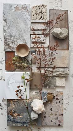 an art work with rocks and plants in it