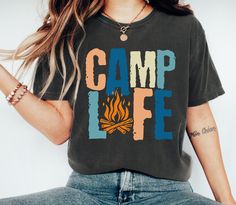 Camp Life Shirt, Happy Camping Shirt, Camping Fire Shirt, Camper Shirt, Nature Lover Shirt, Hiking Gifts, Glamping Shirt, RV Camping Gifts ♥ We use soft and trendy Bella Canvas 3001 brand tees that are loved by our customers. These shirts are unisex and loose fitting. If you'd like a very fitted look we suggest sizing down. If you'd like the oversized look, please size up. ♥ Our shirts are printed using a high end DTG (Direct to Garment) printer that uses water-based inks which are absorbed into Glamping Shirts, Camping Fire, Fire Shirt, Blue Contacts, Camp Life, Hiking Gifts, Camping Gifts, Camping Life, Rv Camping