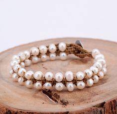 Not only does the Handmade Freshwater Pearl String Knotted Bracelet look great and make the perfect gift for someone. Pearls helps us to discover our true self's. They give us a sense of inner confidence. The Peral symbolizes loyalty and make you wiser and stronger. They will give you Protection and Security from protective it's energy It benefits the Third Eye Chakra with higher intuition, perception, awareness and consciousness. Alternatively, Simply wear it because of its beautiful colour and Adjustable Fair Trade Spiritual Jewelry, Adjustable Fair Trade Bracelets As Gifts, Fair Trade Adjustable Bracelets As Gift, Adjustable Fair Trade Bracelet For Gift, Adjustable Fair Trade Beaded Bracelets As Gifts, Adjustable Fair Trade Beaded Bracelets Gift, Fair Trade Bracelets For Gift, Adjustable Fair Trade Jewelry For Gifts, Natural Round Beads Bracelets As Gift