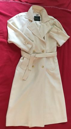 "Beautiful double breasted pure wool trench coat from The Scotch House. Made in England. Length from collar to hem 46\" Pit to cuff 16 1/2\" note this is a raglan sleeve Pit to pit 22\" x 2 Marked a U.S. 8 but would easily fit a 10 - 12" Scottish House, White Trench Coat, Woodstock Ga, Wool Trench Coat, Wool Winter, House Made, Winter White, Woodstock, Scotch