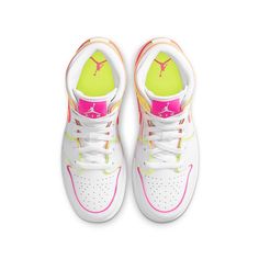 The colorful Nike Air Jordan 1 Mid GS "Edge Glow" gives the classic silhouette a neon twist. With white premium leather as the backdrop, all detailing such as the ankle and heel panels, Swoosh and eyestay are outlined with neon materials. Grab the "Edge Glow" if you want all eyes on you. Now available in children's sizes. Swag Shoes Nike, Neon Jordans, Nike Shoes Colorful, Neon Nikes, Neon Nike Shoes, Gold Nike Shoes, Colorful Nike, Shoes Preppy, Cute Jordans