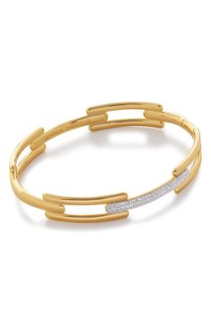 Link-inspired bars give sleek structure to a sterling silver bangle plated in 18-karat gold and lit up with lab-created diamond pavé. Exclusive US retailer Small=6”, Medium=6 1/2” inner circumference; 3/8" width Total lab-created diamond weight: 0.37–0.43ct. Clarity: VS Sterling silver/18k-gold plate/lab-created diamond Imported >Diamond Guide Polished Yellow Gold Diamond Cuff Bracelet, Luxury Gold Cuff Bracelet With Pave Setting, Monica Vinader Signature Bangle, Elegant 14k Gold Diamond-cut Bangle, Luxury Sterling Silver Diamond-cut Bangle Bracelet, Monica Vinader, Diamond Guide, Diamond Bangle, Sterling Silver Bangles