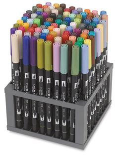 a stack of marker pens sitting on top of each other