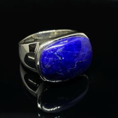 Lapis Lazuli handcraft Ring in 92.5 Sterling Silver Detail of This Gorgeous Ring As Follow: Gross Wt : 10.18 gm Stone : You could improve self-awareness and expressiveness with the aid of this stone. Because it harmonises the mind, body, and spirit, it is also known as the wisdom stone. Wearing it can help prevent mental attacks and reduce tension. Lapis Lazuli has the power to reveal your psychic intelligence. Lapis Lazuli - A September Birthstone. You're a god's favorite child," wondering why? Elegant Lapis Lazuli Ring With Polished Finish, Lapis Lazuli Ring Silver, Blue Lapis Lazuli Signet Ring With Gemstone, Carved Lapis Ring, Artisan Lapis Lazuli Hand-strung Jewelry, Reduce Tension, Lapis Lazuli Ring, Gorgeous Ring, Tarnished Silver