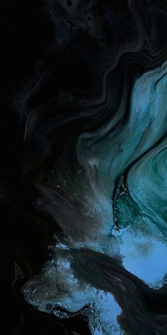 an abstract painting with blue and black colors in the water, as seen from above