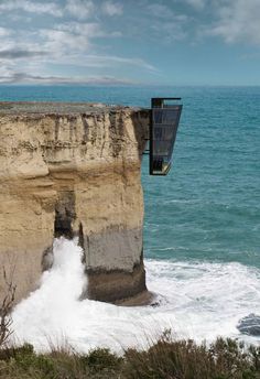 a cliff that has some water coming out of it