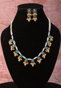 Feroza with its charming hue is sure to captivate one and all. Introducing the elegant Feroza Lightweight Ahmedabadi Jadau Necklace and Earrings Set, featuring 11 dangling units, a fusion of timeless charm and modern sophistication. Crafted with exquisite attention to detail, this set embodies the essence of Ahmedabad's traditional craftsmanship in a lightweight design. Note: This jewelry has no precious metals or stones.Note: Some of the pics are close up shots to show detail and may make the p Jadau Necklace, Necklace And Earrings Set, Necklace And Earrings, Ahmedabad, Earrings Set, Precious Metals, Earring Set, Favorite Jewelry, Close Up